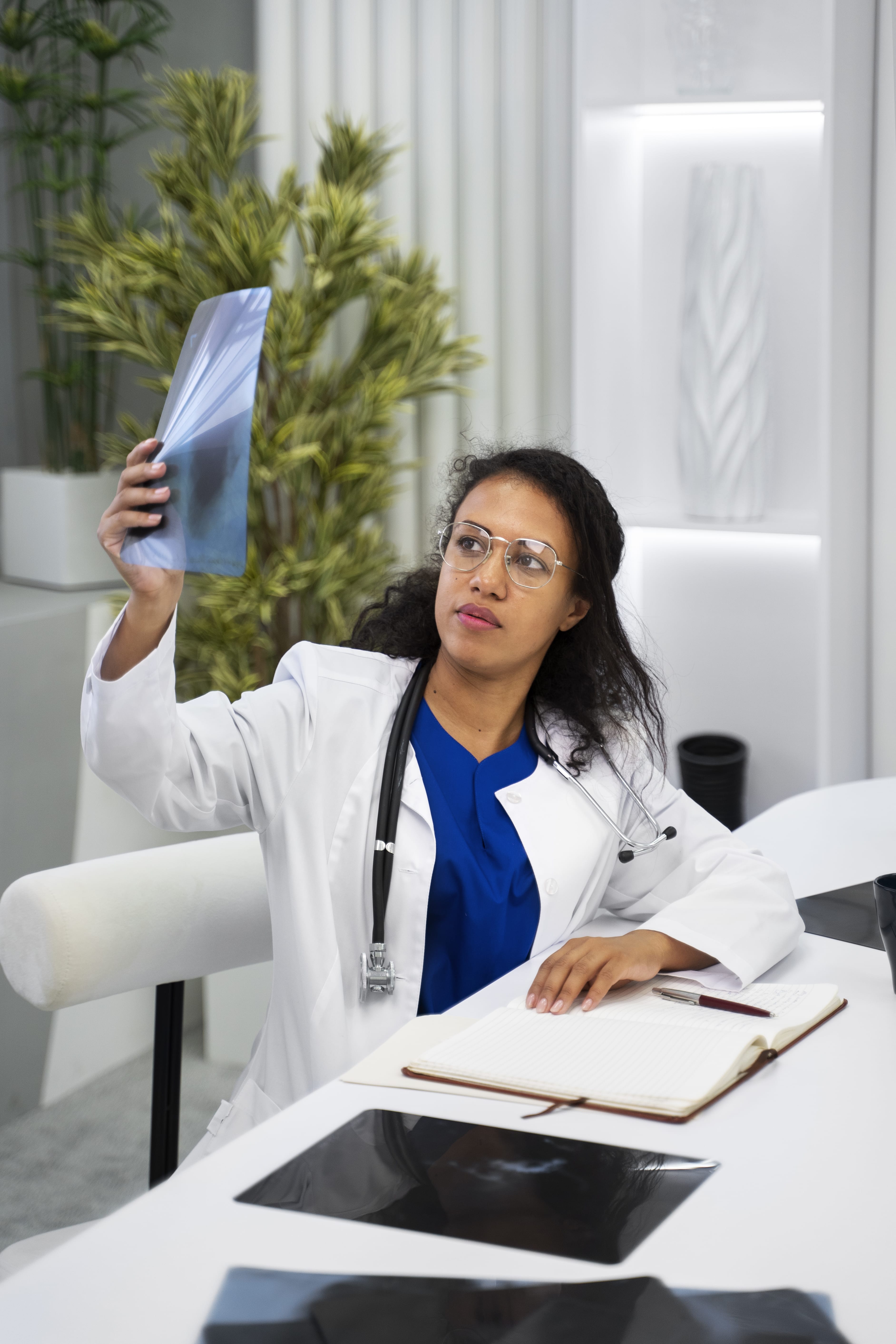 Caregiver assisting elderly woman