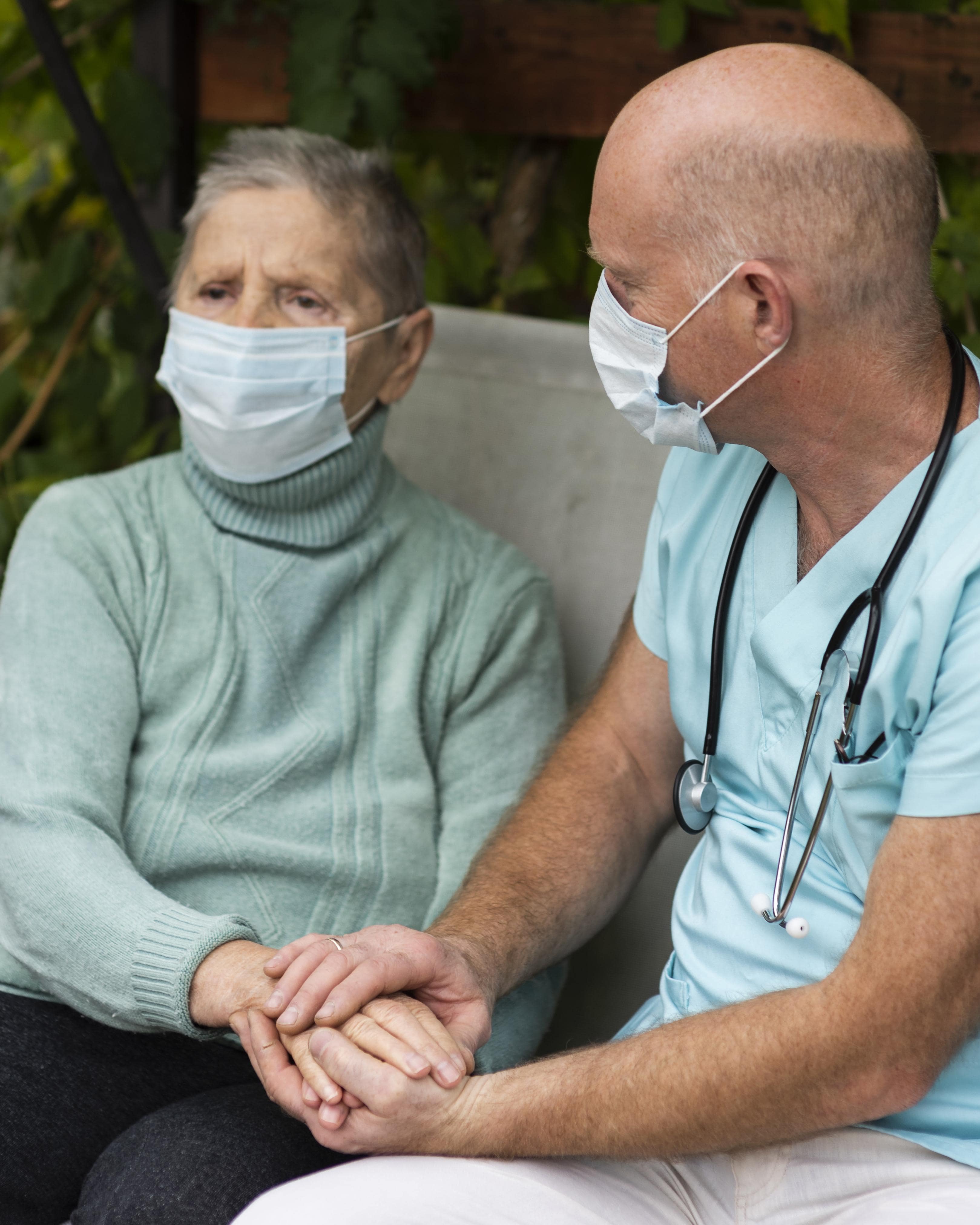 Physical therapist working on leg mobility